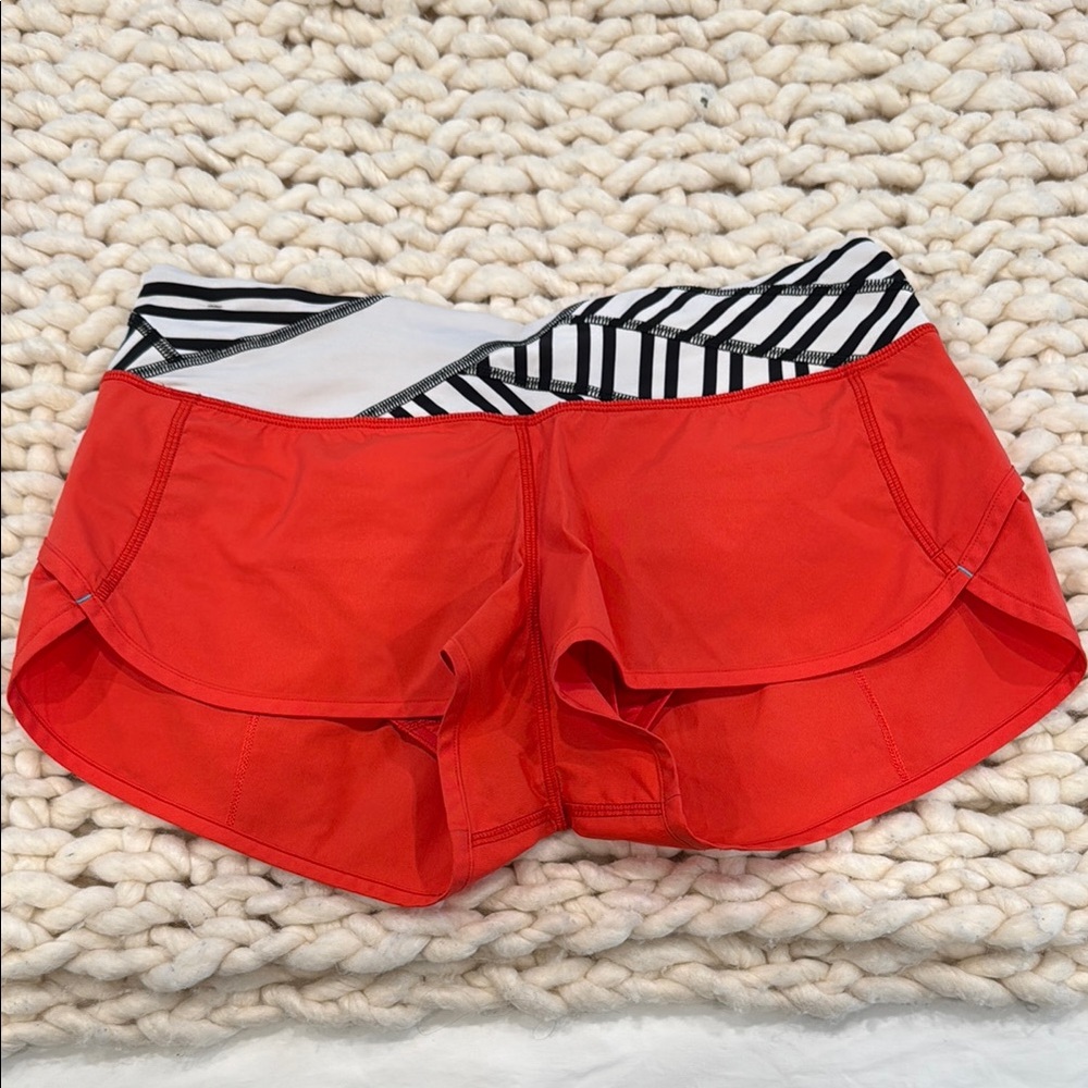 Lululemon Athletica Red and Black Athletic Shorts with Layered Hem